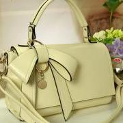 perfect dimensional bow handbag white